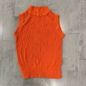 Sleeveless Orange Knit Turtleneck Top